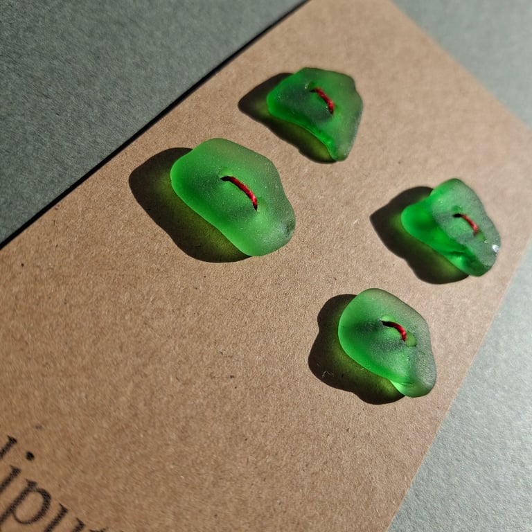 Set of four green sea glass buttons