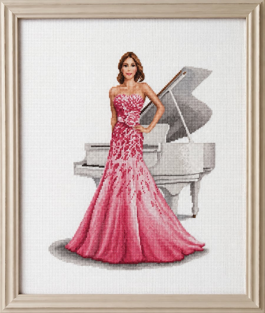 Rose by John Clayton – Completed Lady and Piano Cross-Stitch in Ash Wood Frame