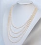 Four Strand Freshwater Pearl Necklace with Vintage Rice Pearls - Image 1