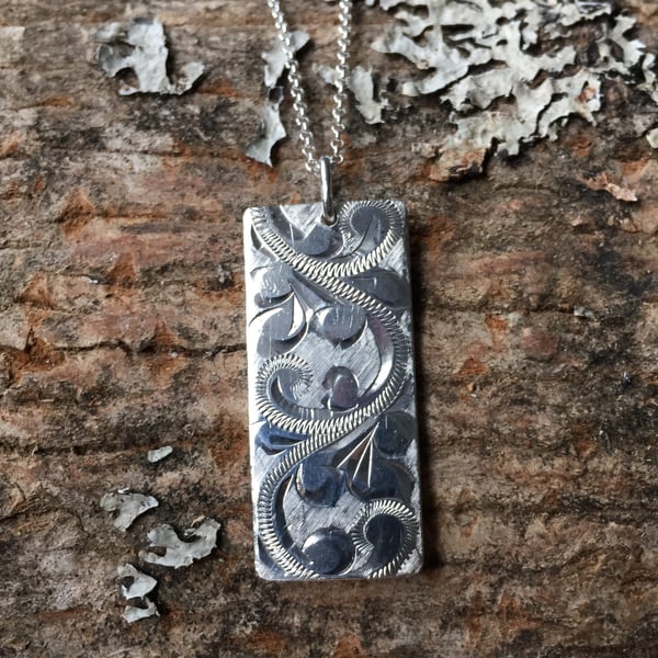 Oblong, silver, engine turned pattern necklace