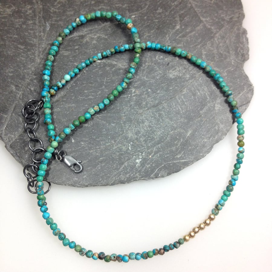 Turquoise 18ct gold and silver necklace.