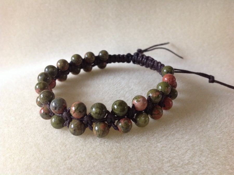 Ukanite gemstone salmon and green woven bracelet.