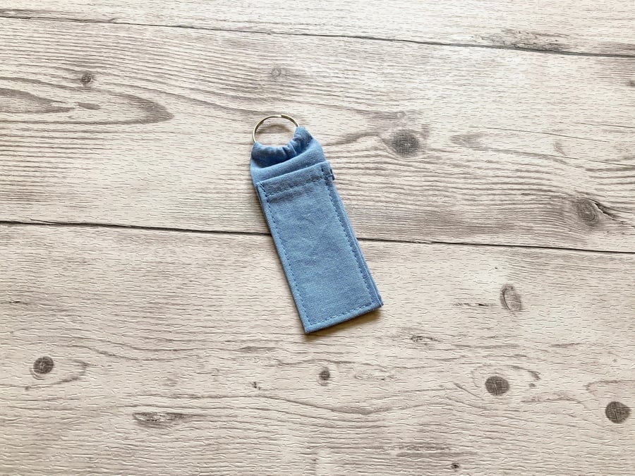 Plain light blue blue lip balm holder. Lipstick cotton fabric keychain.