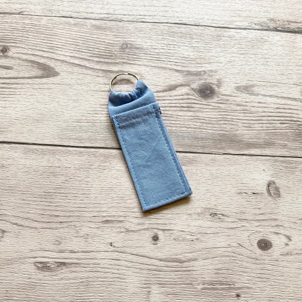 Plain light blue blue lip balm holder. Lipstick cotton fabric keychain.