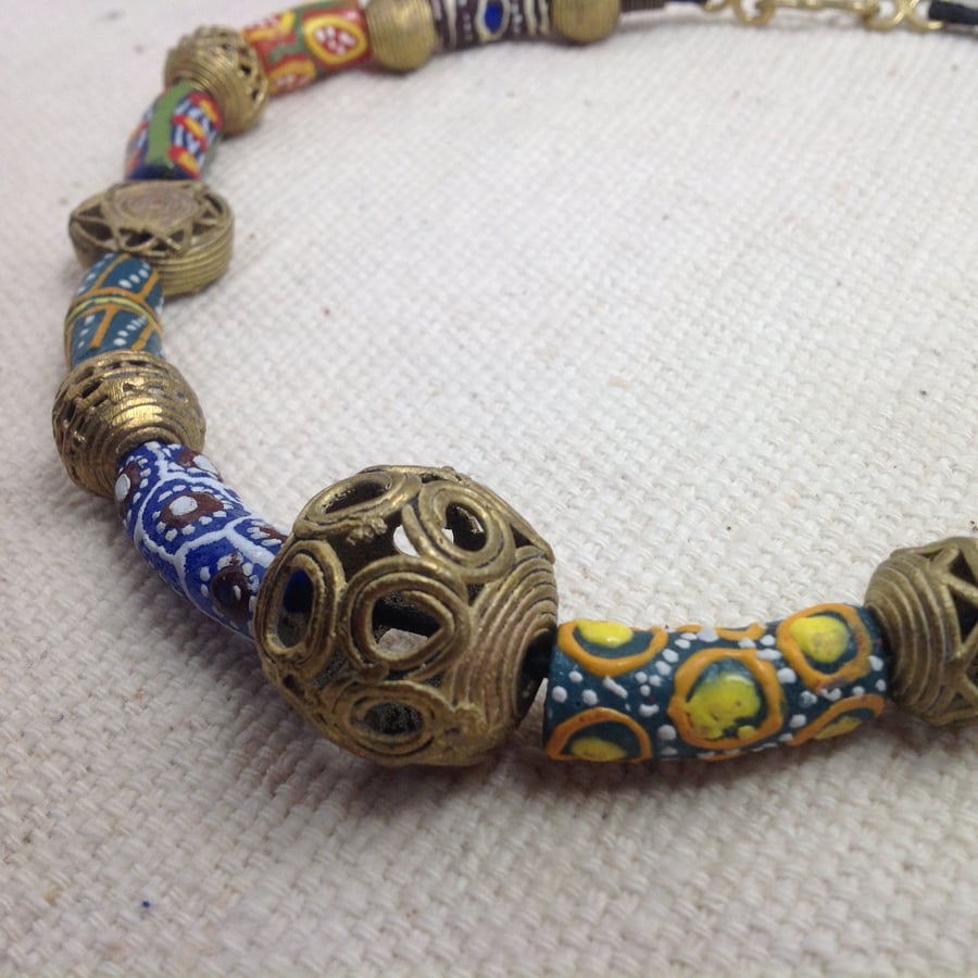 Bead necklace with recycled brass and glass beads and handmade clasp from Ghana