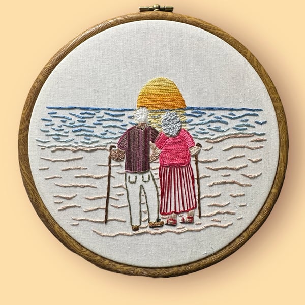 Embroidered beach art,  love and friendship in old age, sun sea sand and sunset