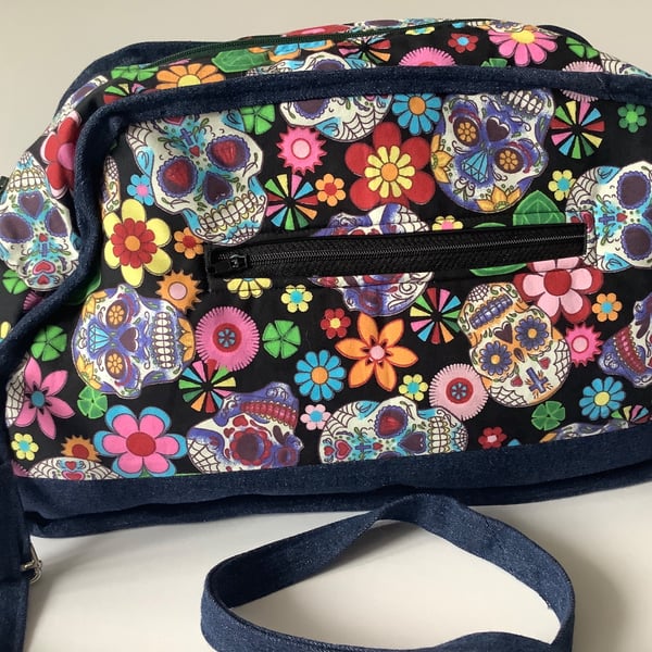 Hand made shoulder bag using repurposed denim and cotton candy skull fabric