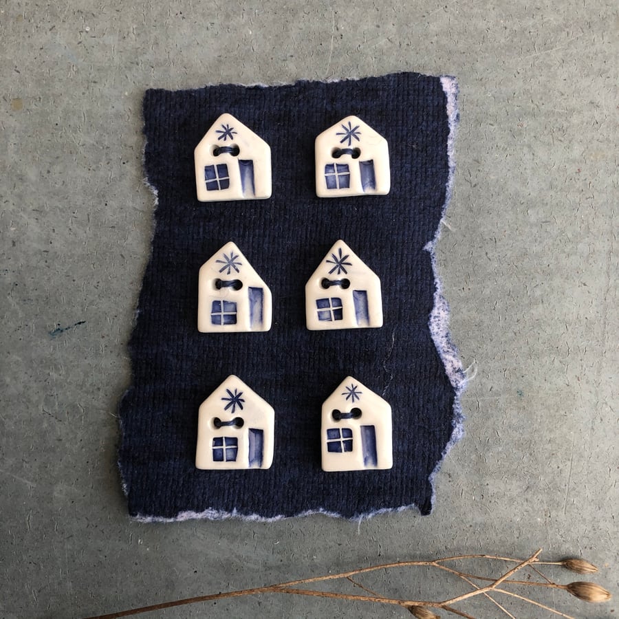 Ceramic house buttons .