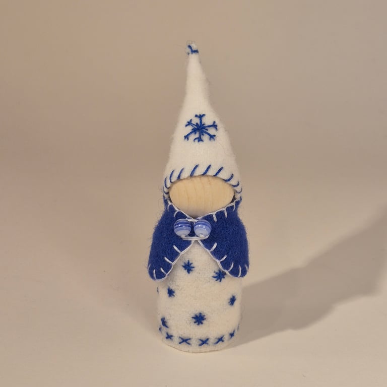 Large wintery gnome with snowflake decorations