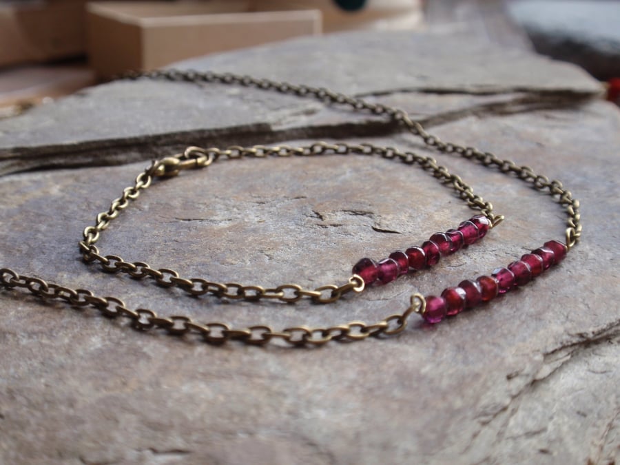 Garnet necklace and bracelet jewellery set with bronze tone metal chain