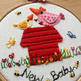 Embroidered hoop art "New Baby"