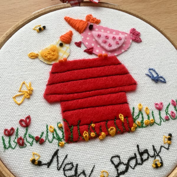 Embroidered hoop art "New Baby"