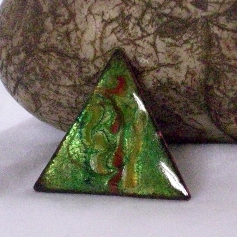 brooch - small triangle scrolled red and yellow on green over clear enamel
