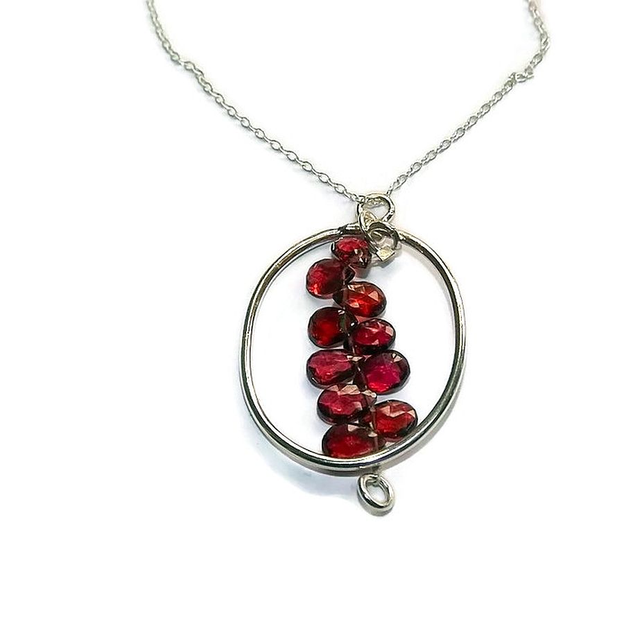 silver and garnet hoop pendant 
