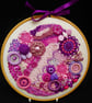 Hoop Art  in  Pinks and Purples Mixed Media in Embroidery Hoop  - Image 1