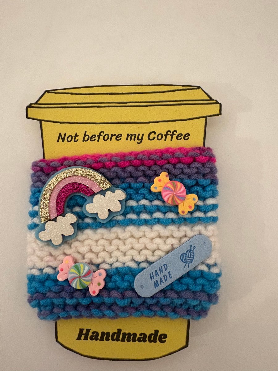 Rainbow and sweets knitted cup cosy. 