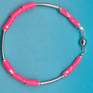 Hot pink thin paper beaded bracelet with magnetic clasp