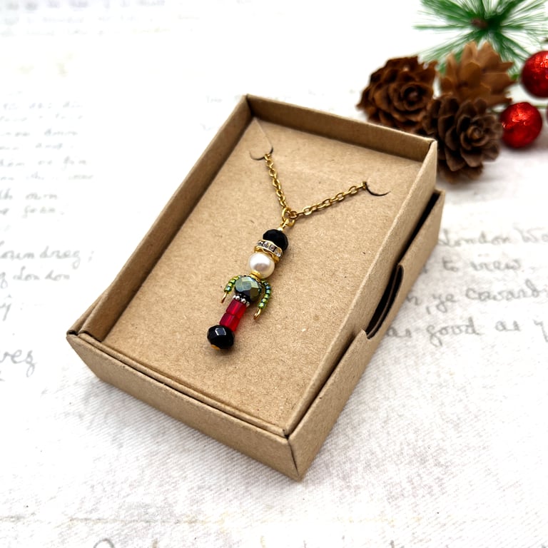 Small crystal Nutcracker pendant in classic red and green christmas jewellery
