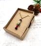 Small crystal Nutcracker pendant in classic red and green christmas jewellery - Image 1