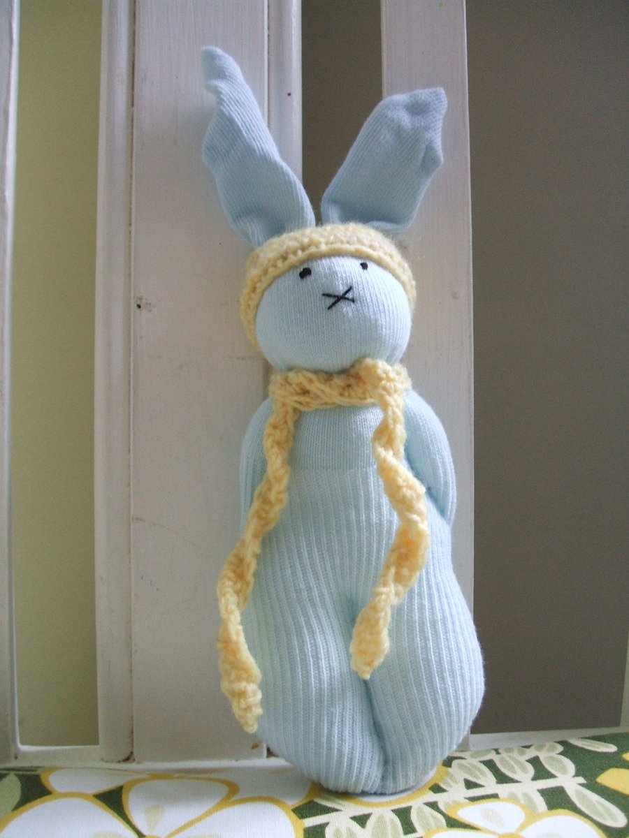Cute bunny soft toy with yellow scarf and hat