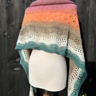 Unique hand knitted extremely shallow crescent wrap scarf in soft wool yarn cake