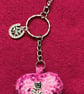 Crochet heart keyring and bag clip in shades of pink 