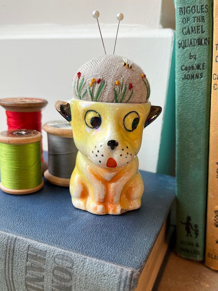 Pin cushion in a vintage dog egg cup embroidered flowers and bee