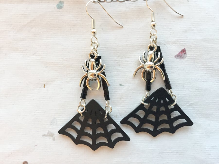 Cobweb and spider chandelier earrings