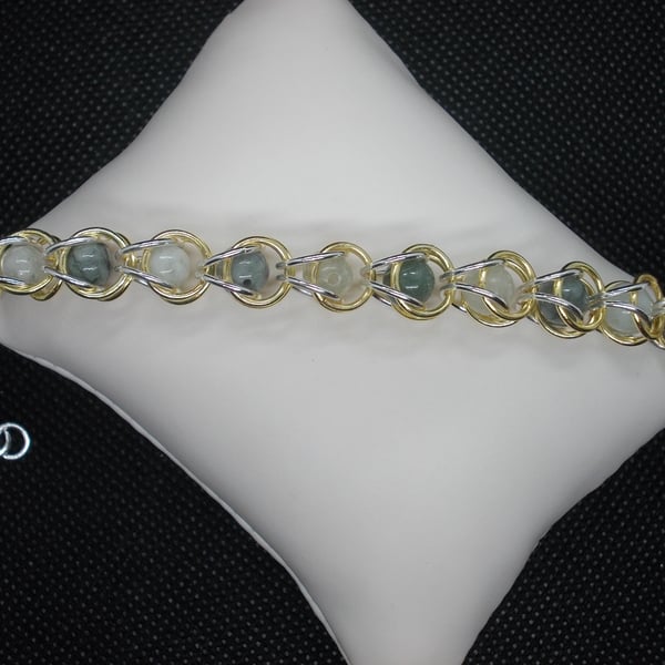 Jadeite captured bead bracelet