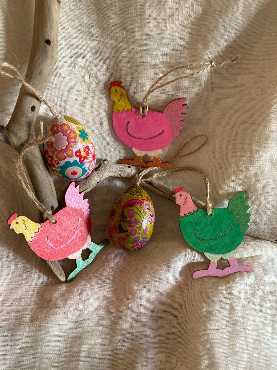 3 cluck cluck hens and 2 eggs 