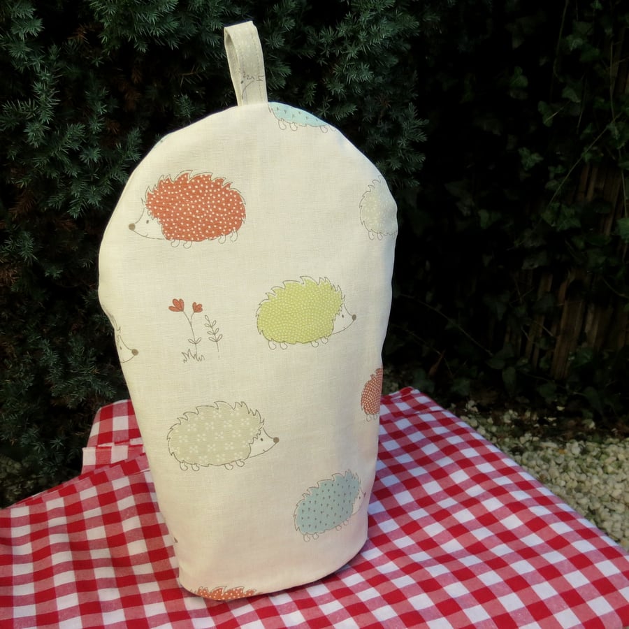 Hedgehogs.  A coffee cosy, size large.  To fit a 6 - 8 cup cafetiere.