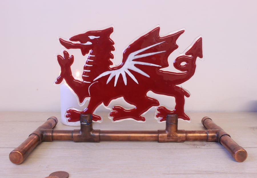 Dragon on copper stand