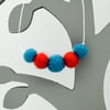 Felted bead necklace in red and blue wool