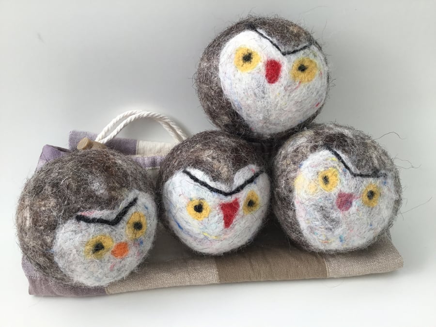 Owl design Tumble dryer balls made from felted wool. 