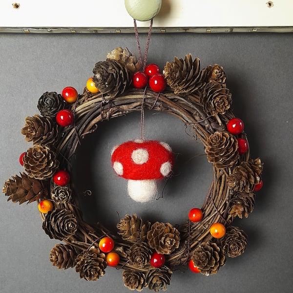 Autumn Wreath with Toadstools, Fir Cones and Berries. 