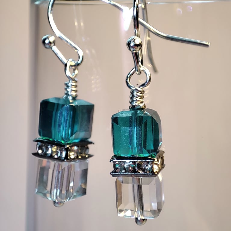 Crystal earrings with silver plated wires, teal and clear