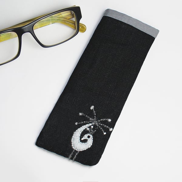 Black twill glasses case with monochrome wool peacock