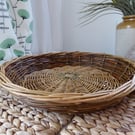 Handmade round willow basket with shallow sides