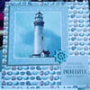 Lighthouse in a stormy sky happy birthday card