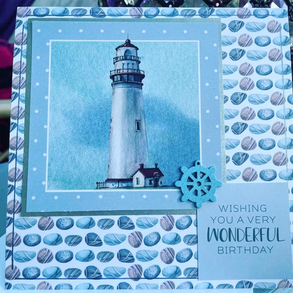 Lighthouse in a stormy sky happy birthday card
