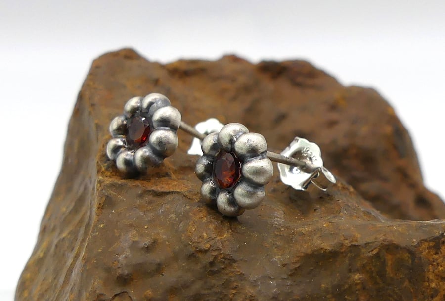 Recycled Sterling Silver Flower Stud Earrings with Garnet Gemstones.