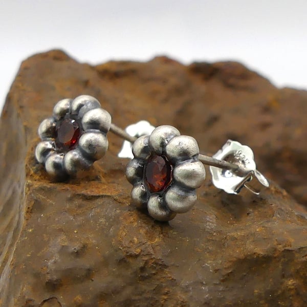 Recycled Sterling Silver Flower Stud Earrings with Garnet Gemstones.