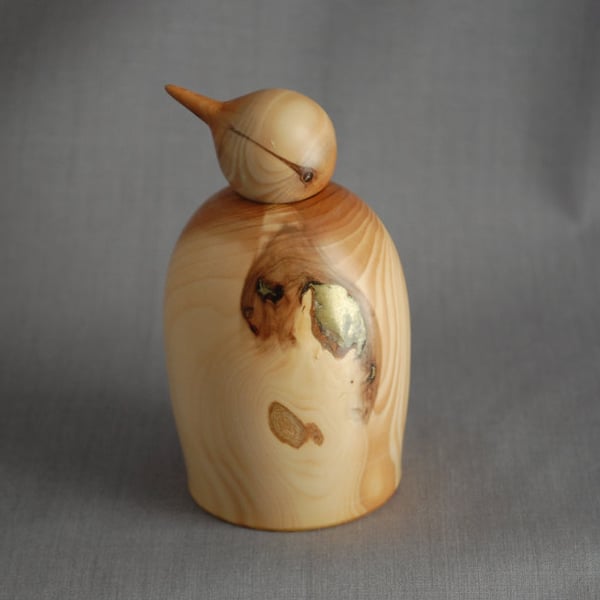 Yew Penguin with Golden Badge