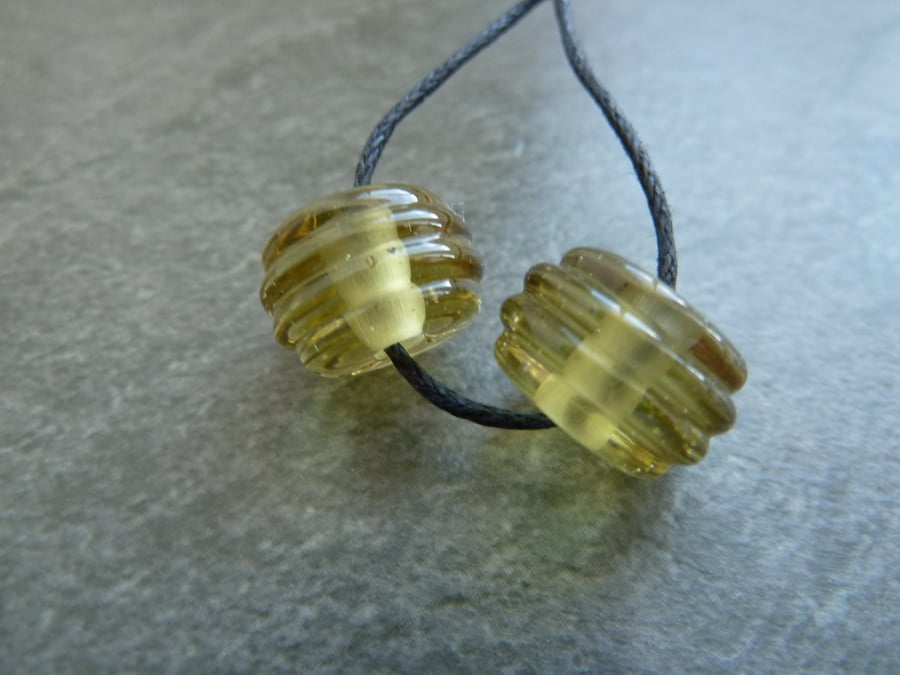 lampwork glass beads, pale yellow ribbed pair