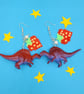 Handmade up-cycled dinosaur earrings with strawberry charms 