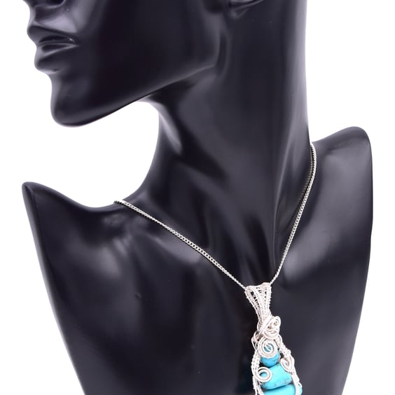 Three beaded turquoise pendant; wire weaved pendant