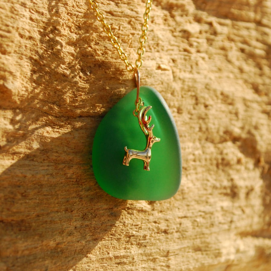 Sea glass pendant with golden deer