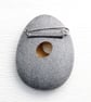 Pebble brooch with gilded hole that goes through the stone. Nature inspired. - Image 5