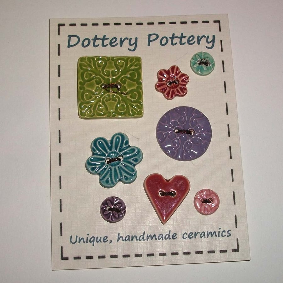 Set of eight assorted handmade ceramic buttons