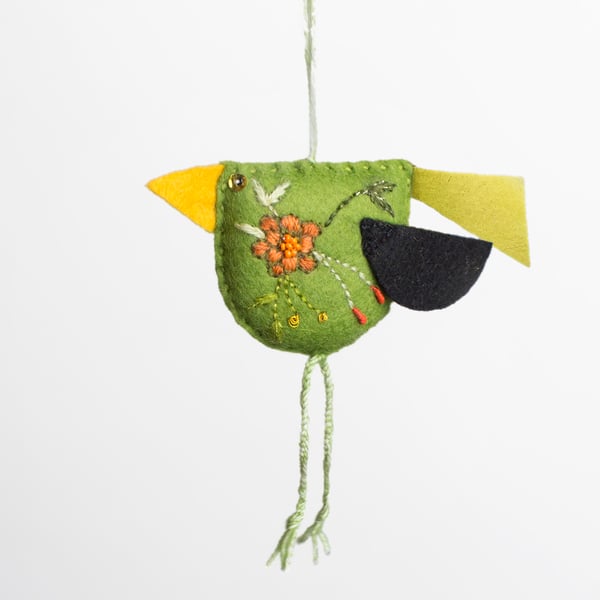 Green coloured hand embroidered bird-shaped hanging decoration called Big Chixy